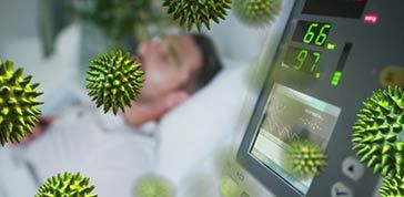 Animation of green macro corona virus spreading and floating with digital display of health monitor and a sick Caucasian man lying in hospital bed in the background. Global health warning scare spreading infections concept digital composite.