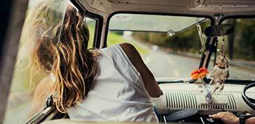 diverse group of people enjoying a road trip and festival