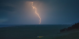 Thunderstorm with lightning on the berig of Lake Baikal.